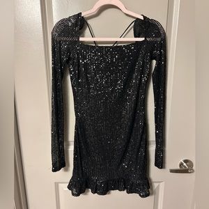 Black sequin Lucy in the Sky dress.